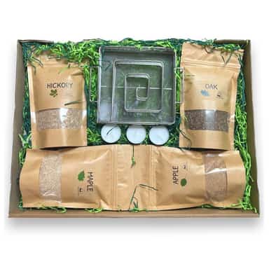 Cold smoking starter kit contents including the ProQ maze, wood dust and tealights