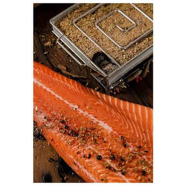 ProQ cold smoke generator set inside a covered BBQ for cold smoking