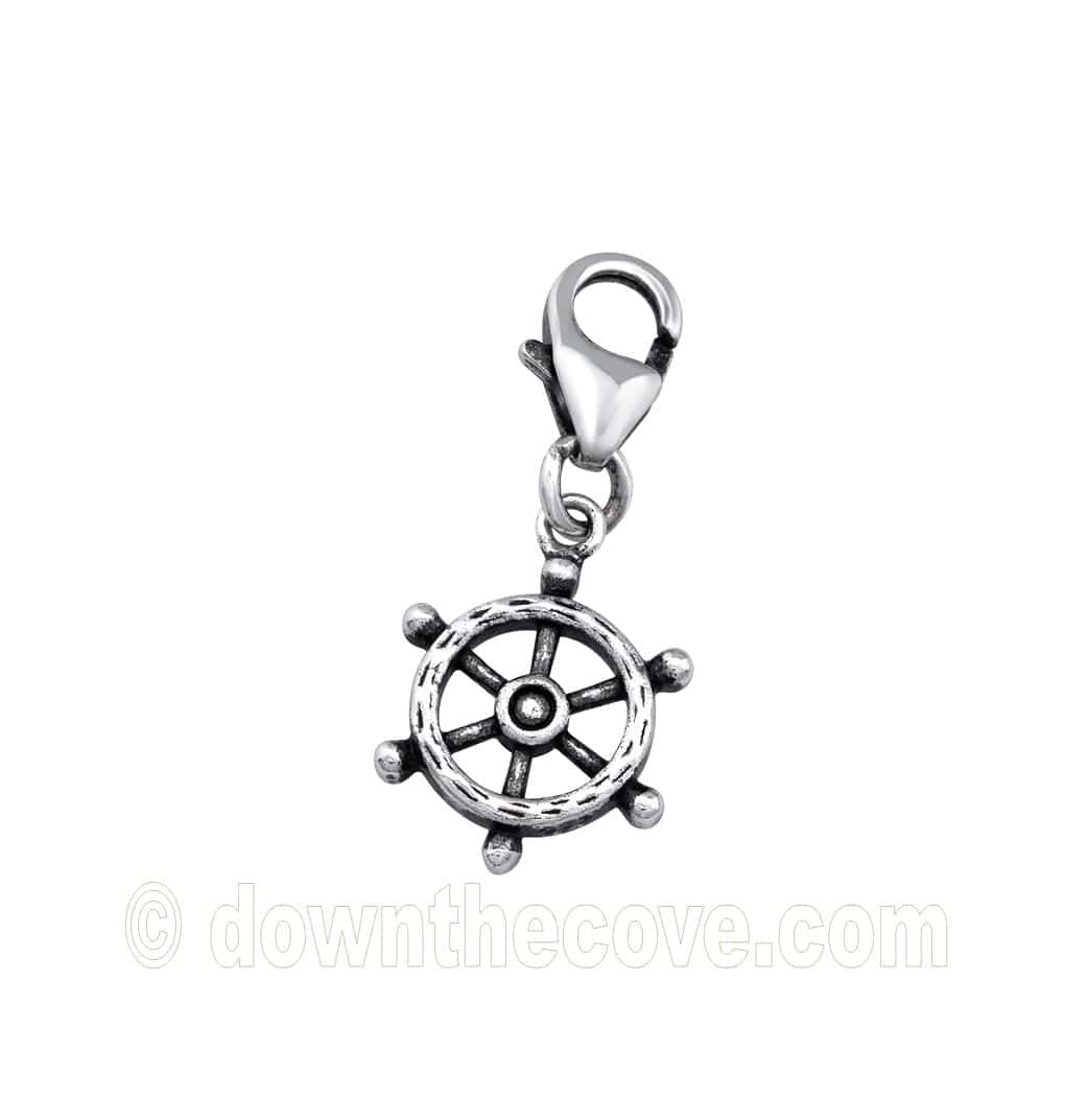 Oxidised rhodium plated silver ships wheel charm with eight handles hanging from a lobster clasp