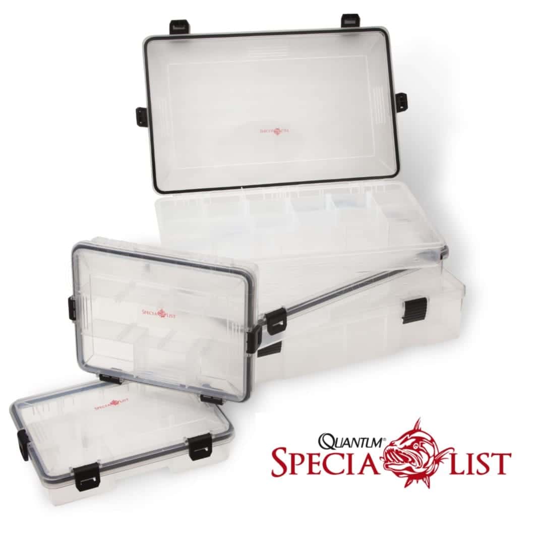 Quantum Specialist waterproof tackle boxes in three sizes, clear lids with black clips, one open showing its compartments