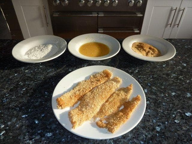 Heat a little rapeseed or light olive oil in a pan. Do not overheat the oil as it will smoke. Fry the fish on one side for a few minutes and then turn and repeat on the other side