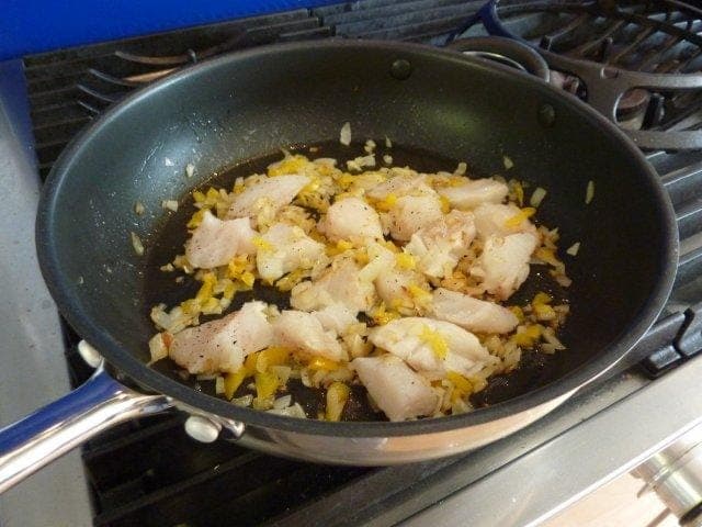 Add bite sized pieces of fish and gently saute for a couple more minutes making sure you don't break the fish up too much